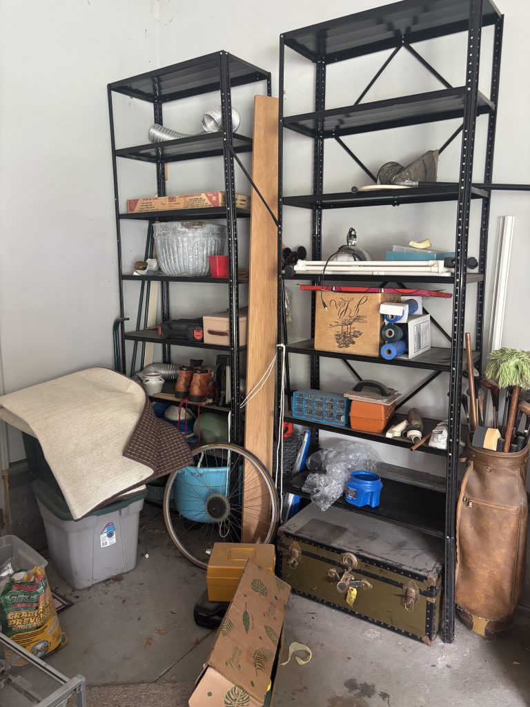 Before photo of a large shelf filled with miscellaneous clutter and items needing removal in Omaha, NE.