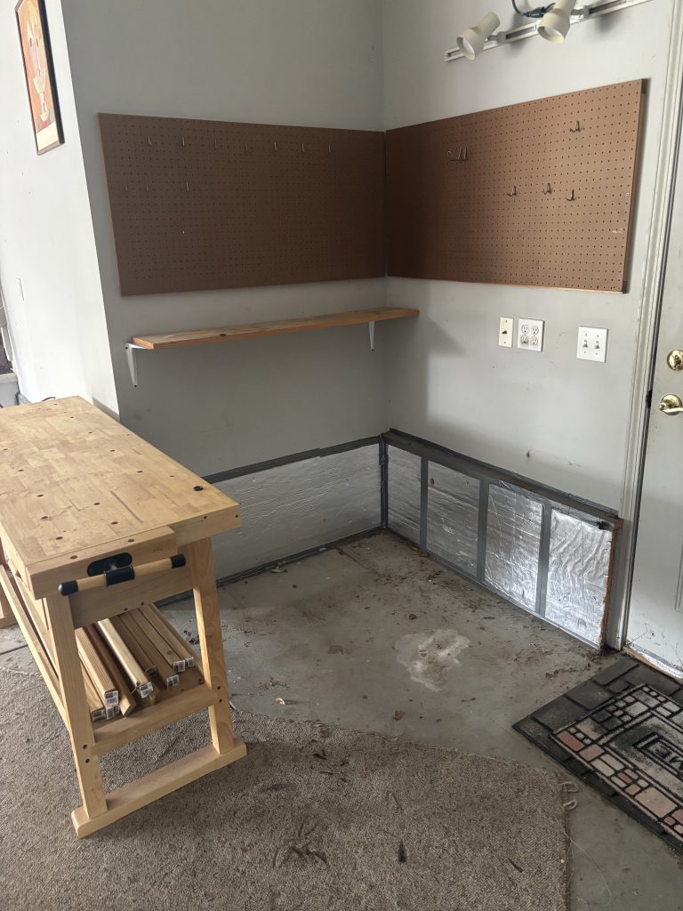 After photo of a clean, empty garage following a full junk removal service in Omaha, Nebraska.