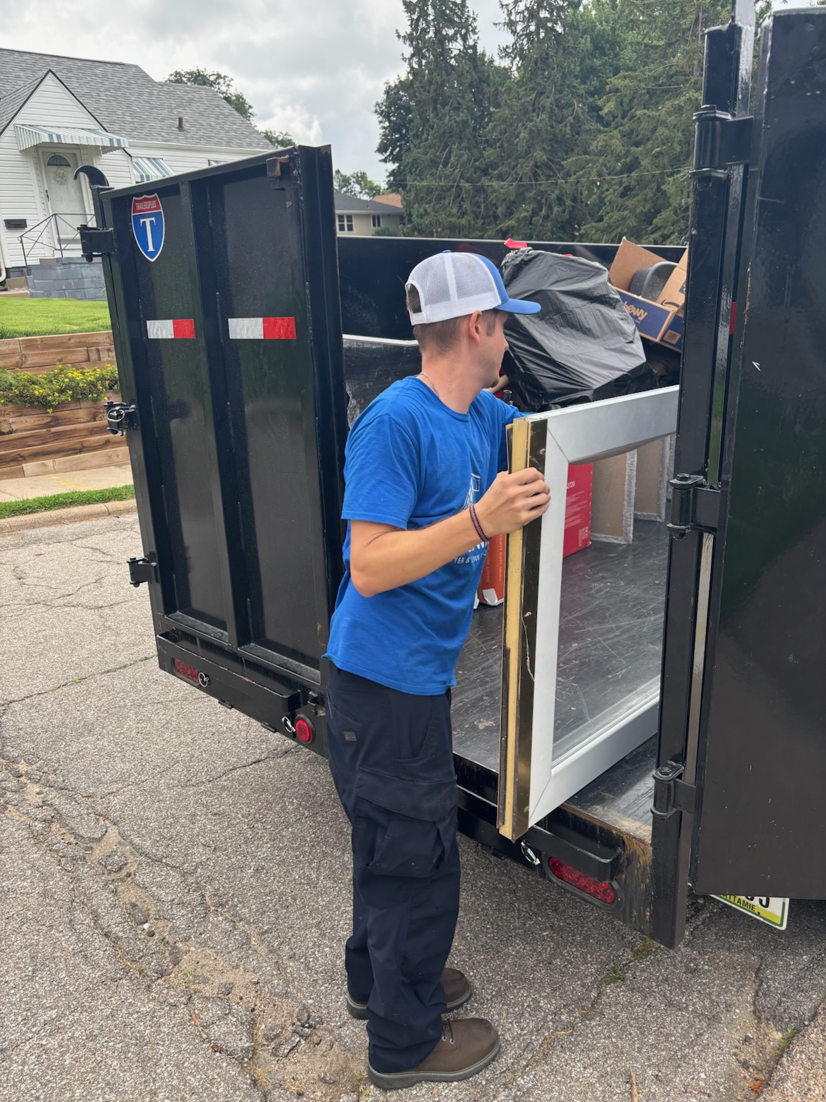 unk removal trailer full of debris in Omaha Nebraska, and Council Bluffs